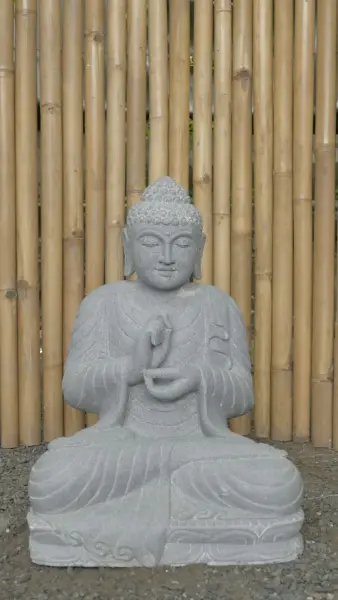 Product image 1 of the product “Seated Buddha made of Riverstone in Dharmachakra position - gesture of wheel of the teaching of Dharma. About 61cm height. ”